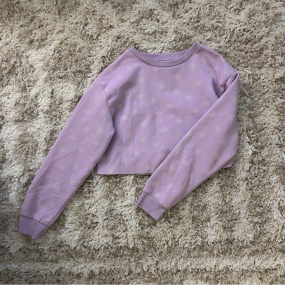 Light purple cropped crewneck with white floral details by refuge, size small.